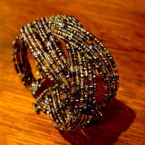 Interwoven chunky bead bracelet.